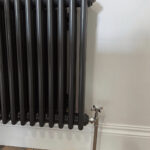 Close up image of Stelrad's Home Column Concept radiator in black